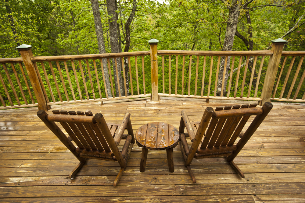 Wooden chairs on cabin porch